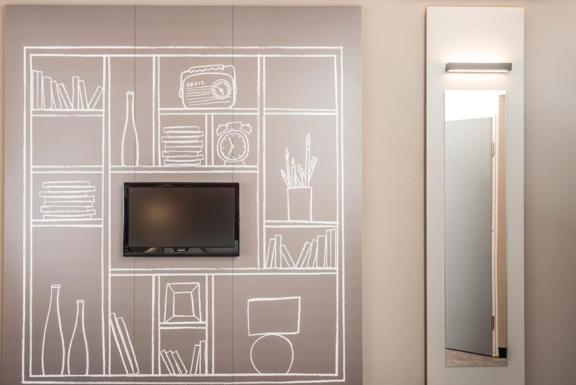 Standaard Kamer met 1 Tweepersoonsbed en 1 Slaapbank