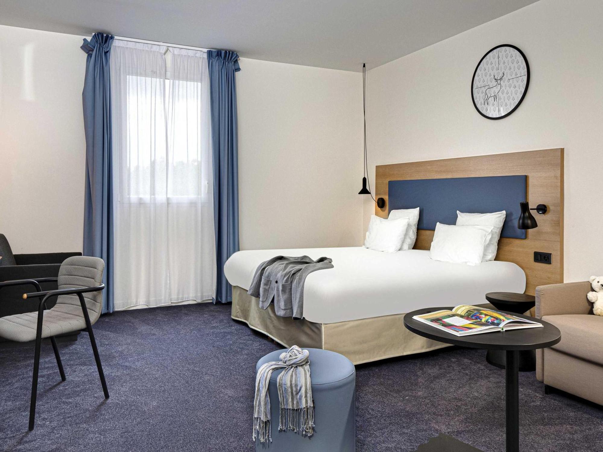 Standard Zimmer mit Queensize-Bett und Sofa