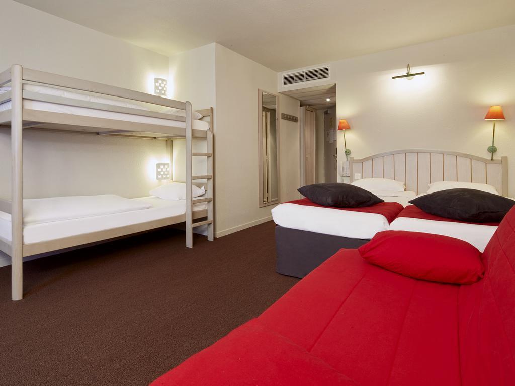 Standard Zweibettzimmer mit 1 Schlafsofa und 2 Etagenbetten